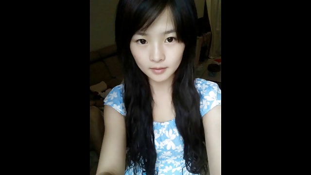 Cute chinese teen dancing on webcam